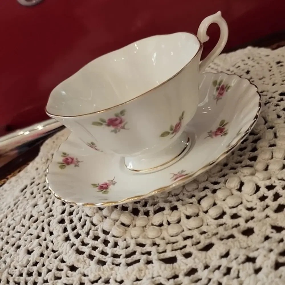 Roral imperial fine bone china ‎ cup an saucer England